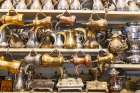 Saudi Arabia, Mecca Province, Jeddah. Antique brass, copper, and tin coffee pots, Al-Balad district Art Print